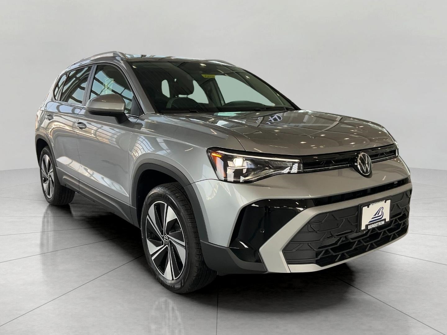 2026 Volkswagen Taos SE 4MOTION in Pyrite Silver Metallic — front three-quarter view